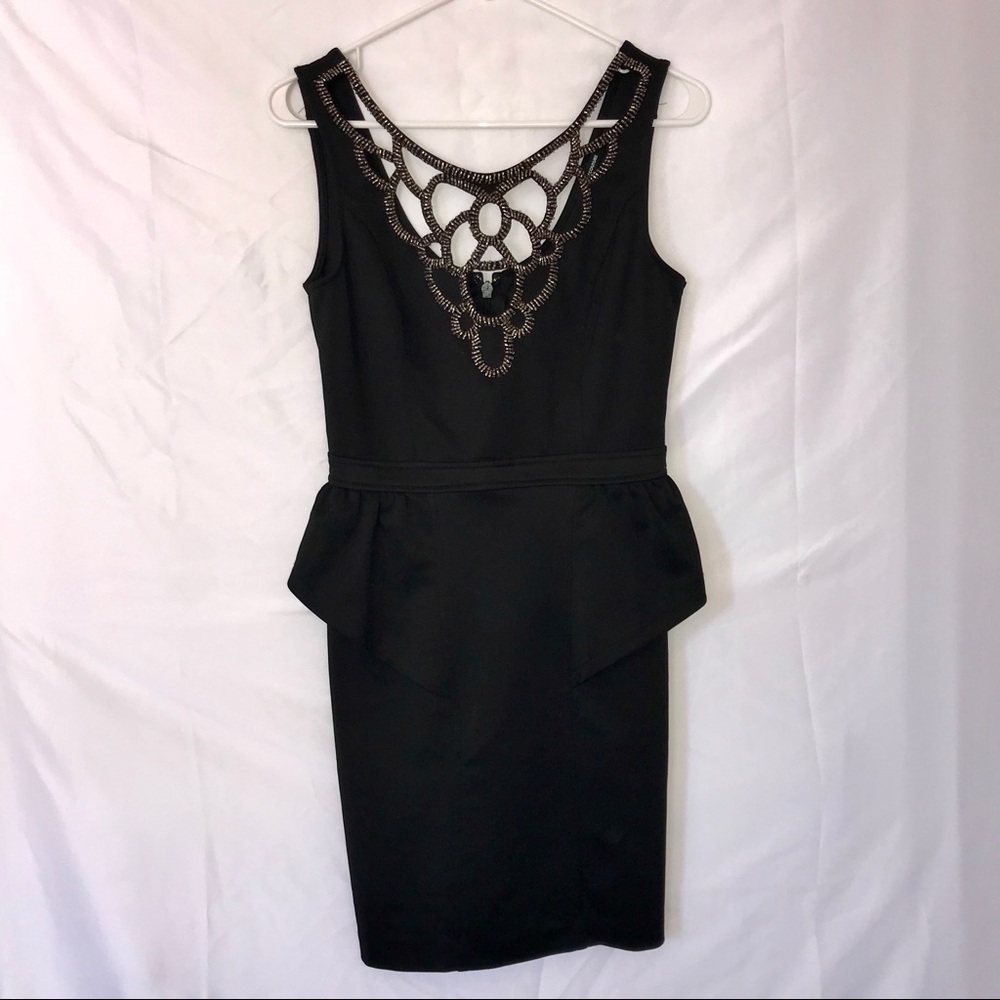 Black bodycon dress with embellished neckline